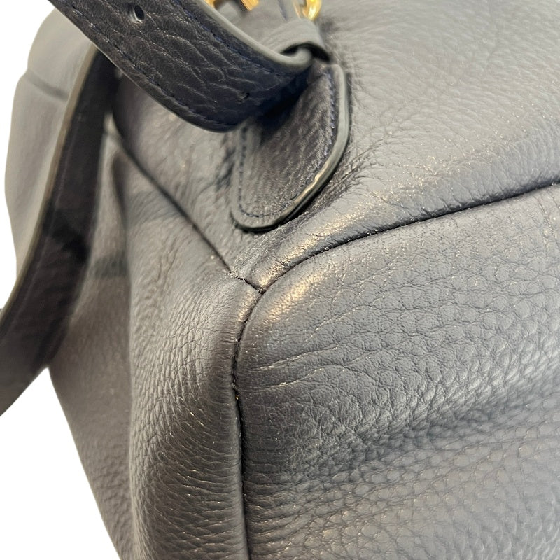 COACH Full Grain Pebbled Leather Backpack Black Calfskin Gold Hardware Front Twist Lock Pocket Spacious Casual Daily Commute Classic Design