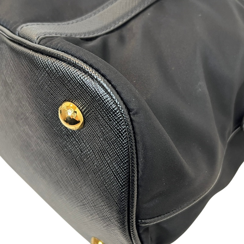 PRADA Tessuto Nylon Dome Handbag Black Nylon Saffiano Leather Trim Gold Hardware Spacious Work Bag with Detachable Shoulder Strap Classic Practical Design