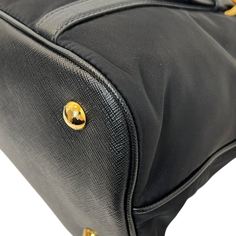 PRADA Tessuto Nylon Dome Handbag Black Nylon Saffiano Leather Trim Gold Hardware Spacious Work Bag with Detachable Shoulder Strap Classic Practical Design
