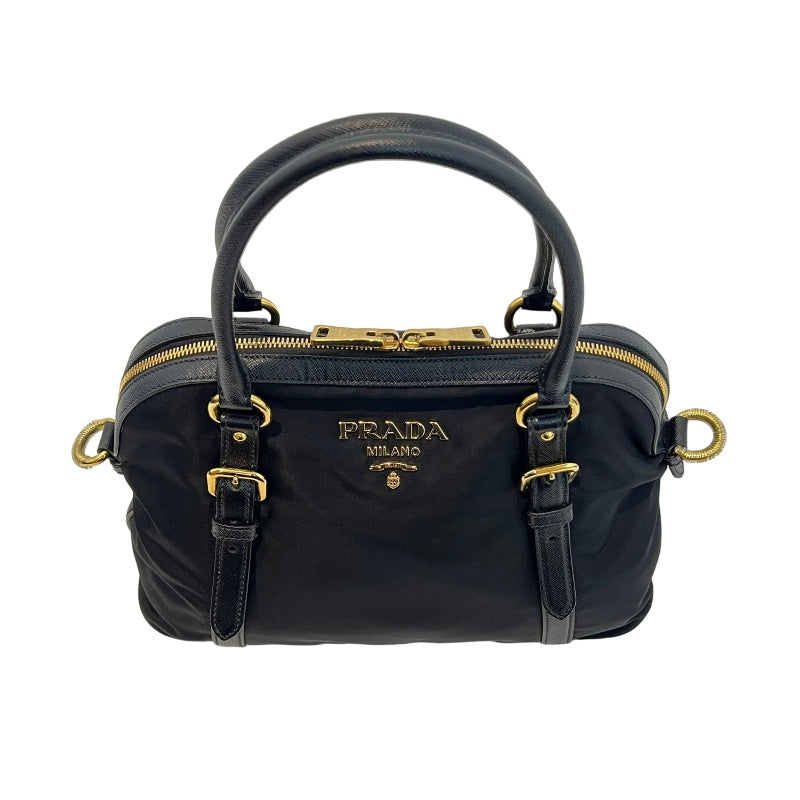 PRADA Tessuto Nylon Dome Handbag Black Nylon Saffiano Leather Trim Gold Hardware Spacious Work Bag with Detachable Shoulder Strap Classic Practical Design