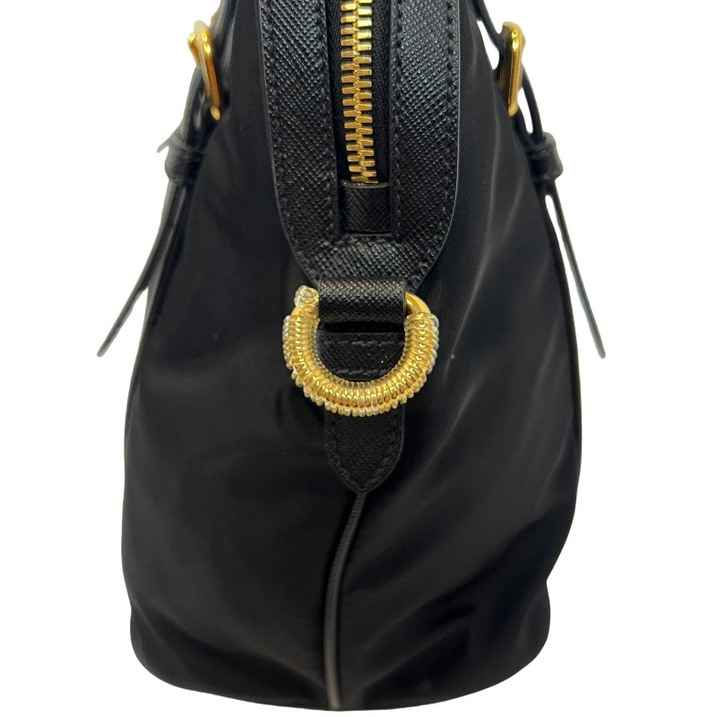 PRADA Tessuto Nylon Dome Handbag Black Nylon Saffiano Leather Trim Gold Hardware Spacious Work Bag with Detachable Shoulder Strap Classic Practical Design