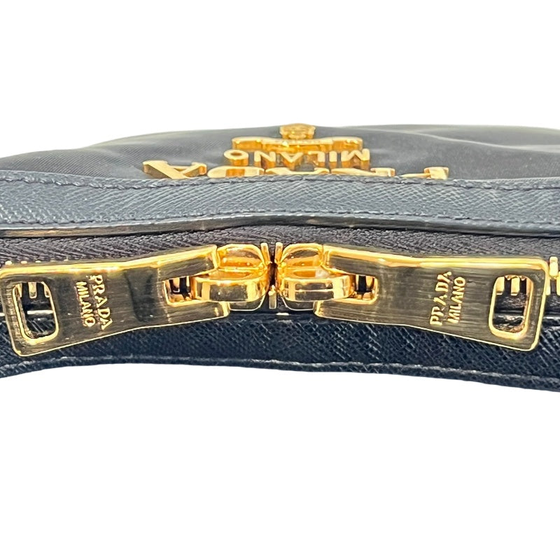 PRADA Tessuto Nylon Dome Handbag Black Nylon Saffiano Leather Trim Gold Hardware Spacious Work Bag with Detachable Shoulder Strap Classic Practical Design