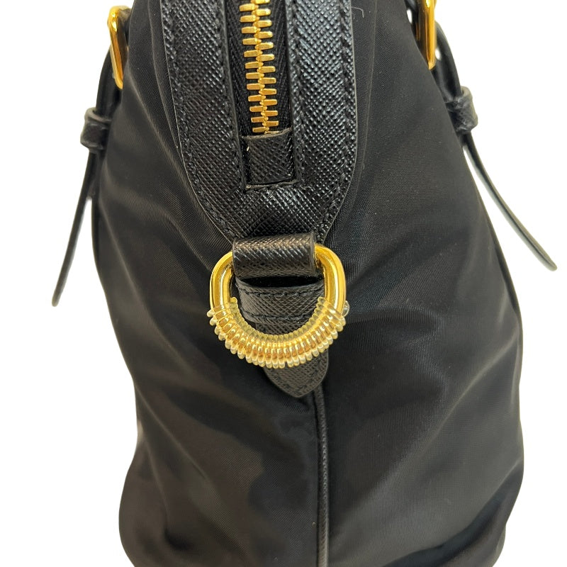 PRADA Tessuto Nylon Dome Handbag Black Nylon Saffiano Leather Trim Gold Hardware Spacious Work Bag with Detachable Shoulder Strap Classic Practical Design