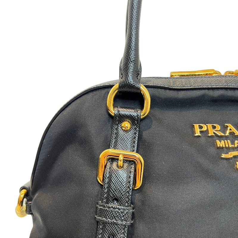 PRADA Tessuto Nylon Dome Handbag Black Nylon Saffiano Leather Trim Gold Hardware Spacious Work Bag with Detachable Shoulder Strap Classic Practical Design