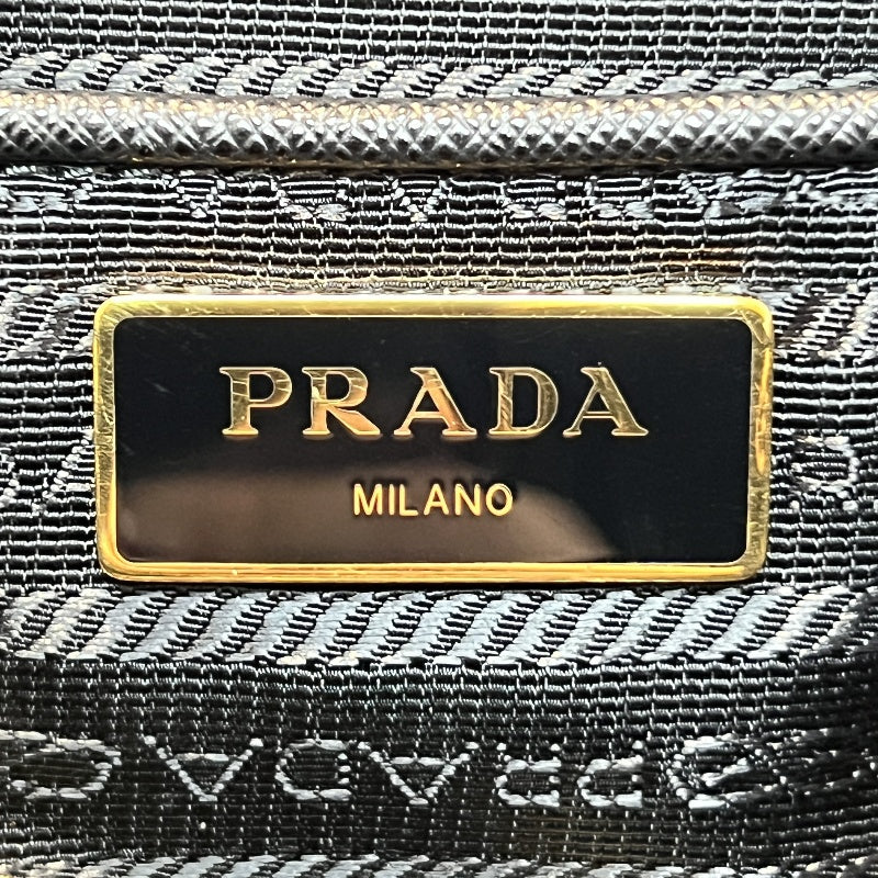 PRADA Tessuto Nylon Dome Handbag Black Nylon Saffiano Leather Trim Gold Hardware Spacious Work Bag with Detachable Shoulder Strap Classic Practical Design