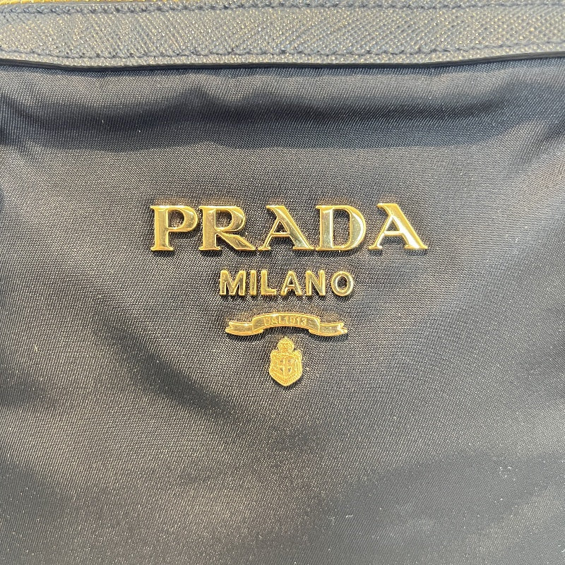 PRADA Tessuto Nylon Dome Handbag Black Nylon Saffiano Leather Trim Gold Hardware Spacious Work Bag with Detachable Shoulder Strap Classic Practical Design
