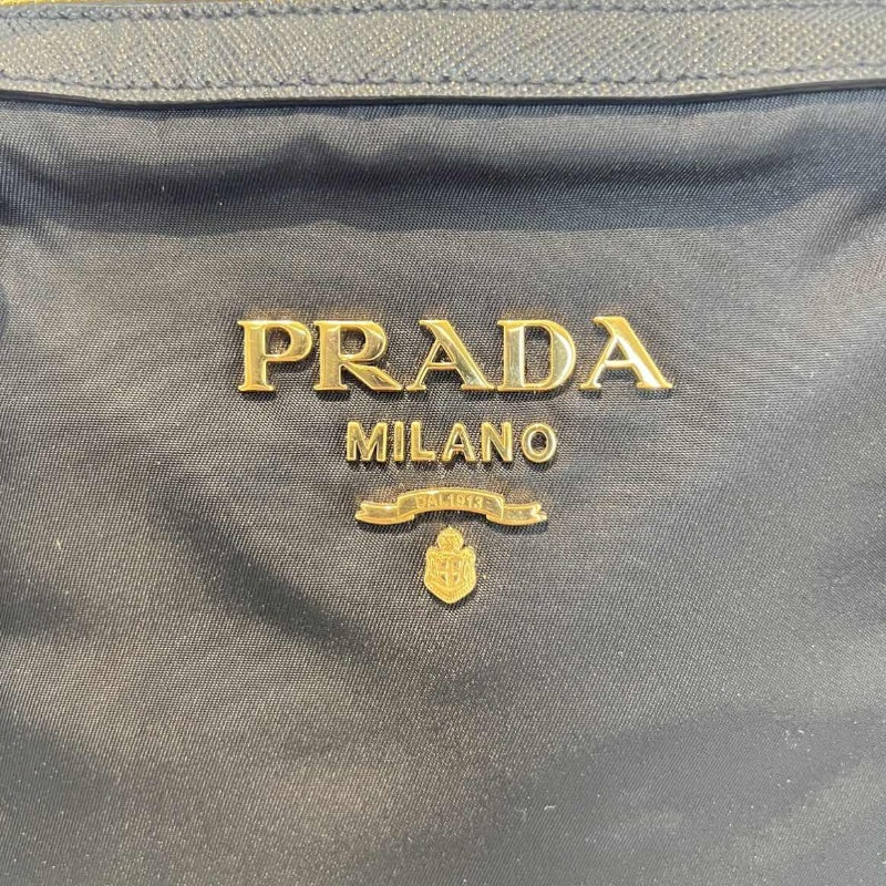 PRADA Tessuto Nylon Dome Handbag Black Nylon Saffiano Leather Trim Gold Hardware Spacious Work Bag with Detachable Shoulder Strap Classic Practical Design