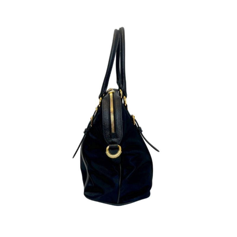 PRADA Tessuto Nylon Dome Handbag Black Nylon Saffiano Leather Trim Gold Hardware Spacious Work Bag with Detachable Shoulder Strap Classic Practical Design
