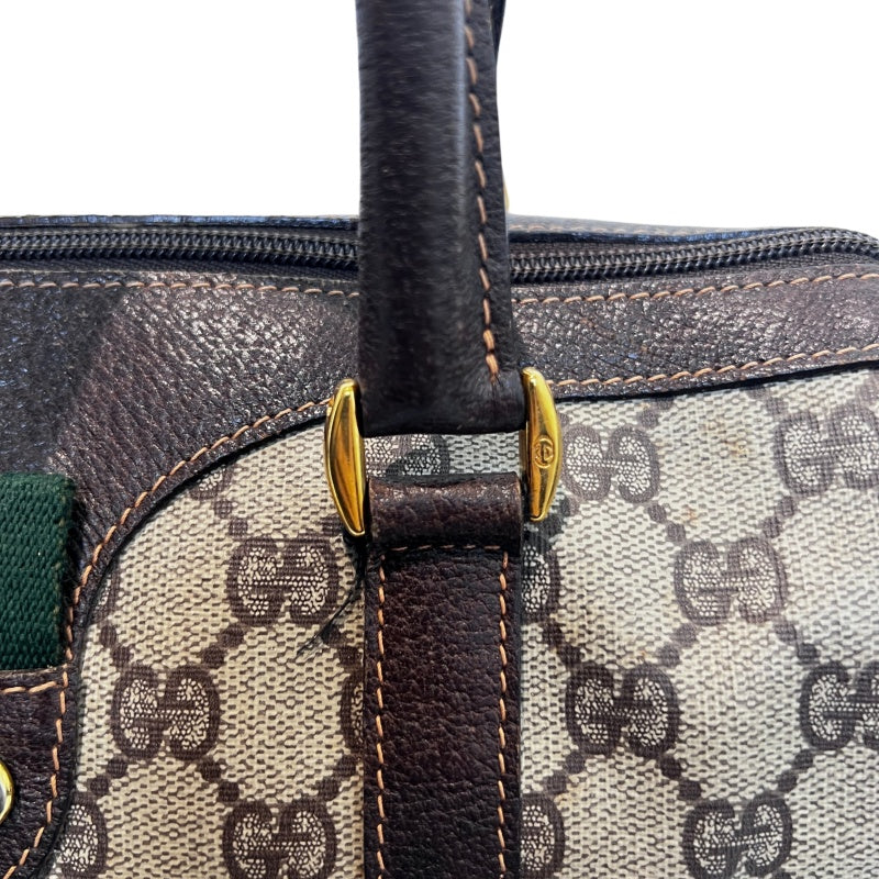 GUCCI Vintage GG Supreme Monogram Sherry Line Boston Handbag With Brown Leather Trim And Web Ribbon, Gold Hardware
