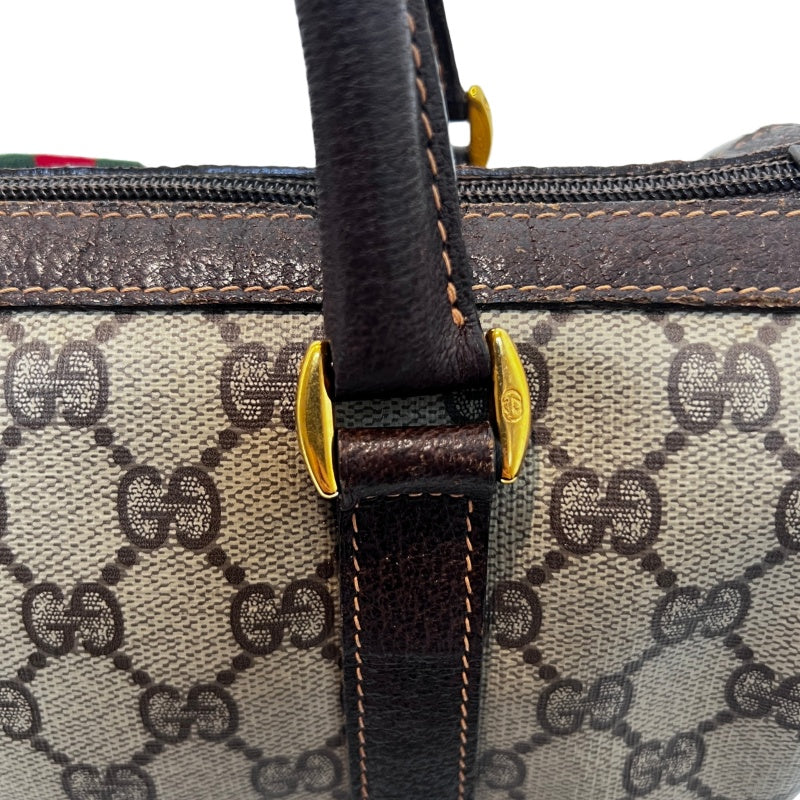 GUCCI Vintage GG Supreme Monogram Sherry Line Boston Handbag With Brown Leather Trim And Web Ribbon, Gold Hardware