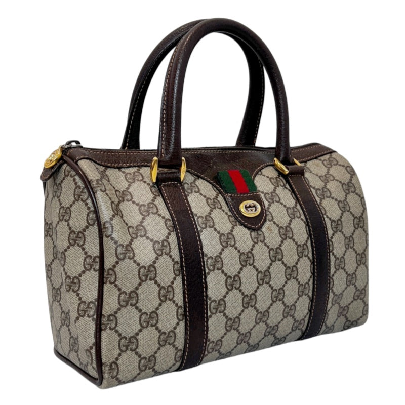 GUCCI Vintage GG Supreme Monogram Sherry Line Boston Handbag With Brown Leather Trim And Web Ribbon, Gold Hardware