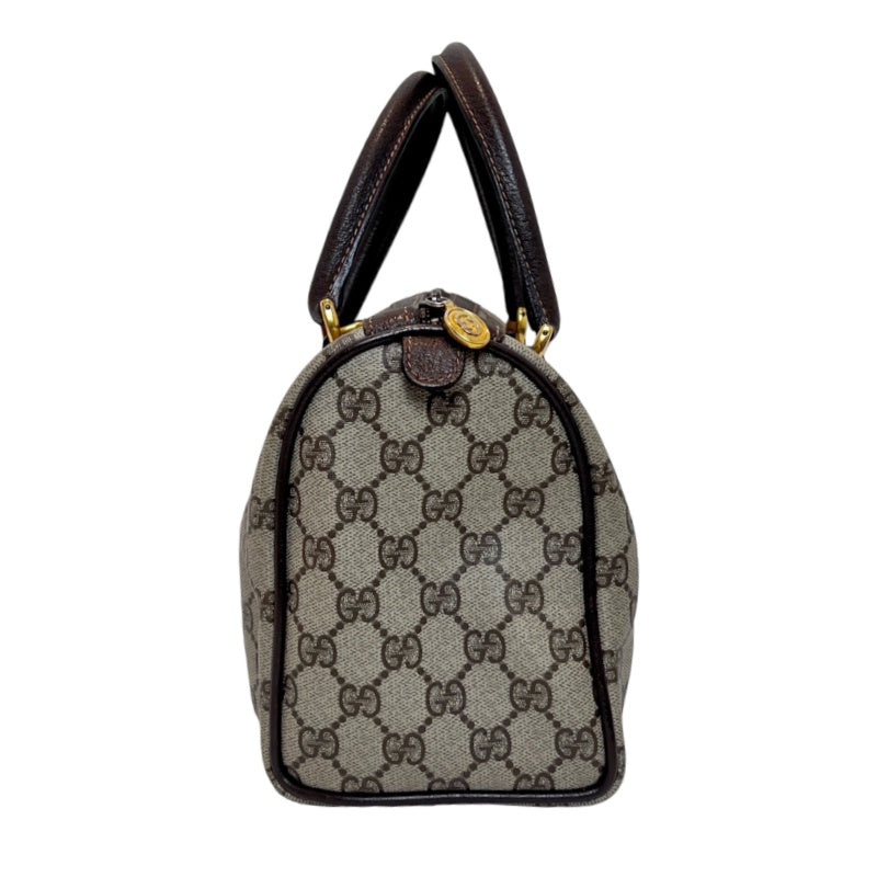 GUCCI Vintage GG Supreme Monogram Sherry Line Boston Handbag With Brown Leather Trim And Web Ribbon, Gold Hardware