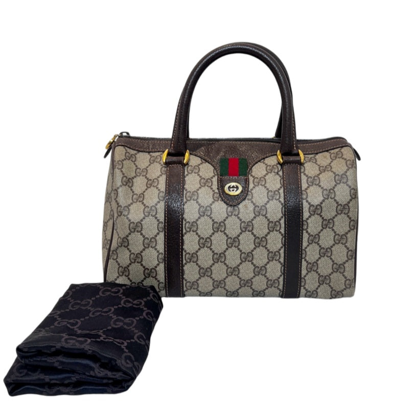GUCCI Vintage GG Supreme Monogram Sherry Line Boston Handbag With Brown Leather Trim And Web Ribbon, Gold Hardware
