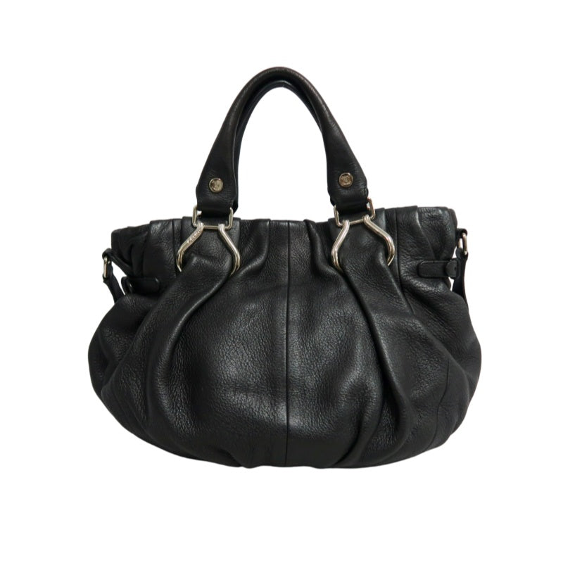CELINE Gathered Soft Calfskin Handbag Black Pebbled Leather Gold Brand Medallion Charm Removable Shoulder Strap Compatible Spacious Vintage Classic Casual Commute Bag