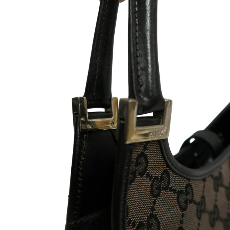GUCCI GG Monogram Canvas Jackie Hobo Handbag Dark Brown Classic Pattern Black Leather Trim Silver Hardware Vintage Iconic Elegant Casual Shoulder Bag