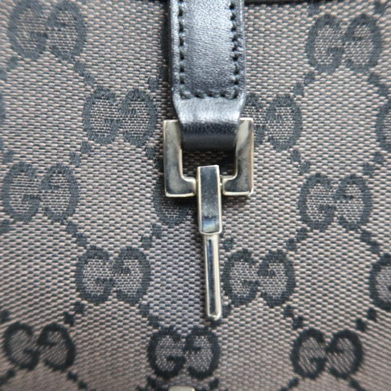 GUCCI GG Monogram Canvas Jackie Hobo Handbag Dark Brown Classic Pattern Black Leather Trim Silver Hardware Vintage Iconic Elegant Casual Shoulder Bag
