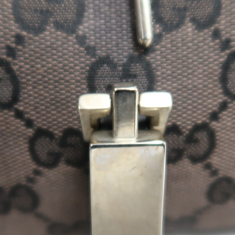 GUCCI GG Monogram Canvas Jackie Hobo Handbag Dark Brown Classic Pattern Black Leather Trim Silver Hardware Vintage Iconic Elegant Casual Shoulder Bag