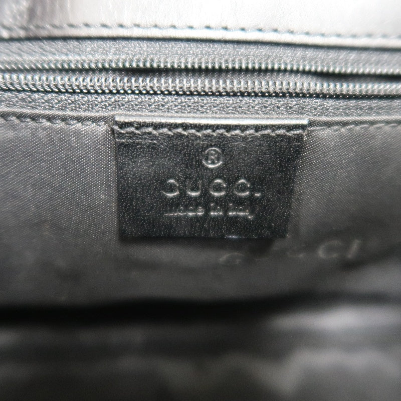 GUCCI GG Monogram Canvas Jackie Hobo Handbag Dark Brown Classic Pattern Black Leather Trim Silver Hardware Vintage Iconic Elegant Casual Shoulder Bag
