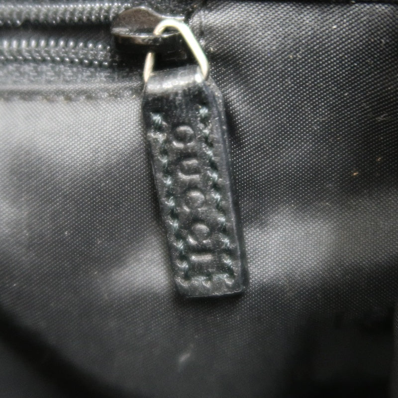 GUCCI GG Monogram Canvas Jackie Hobo Handbag Dark Brown Classic Pattern Black Leather Trim Silver Hardware Vintage Iconic Elegant Casual Shoulder Bag