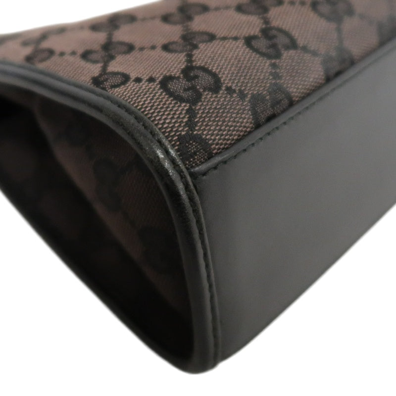 GUCCI GG Monogram Canvas Jackie Hobo Handbag Dark Brown Classic Pattern Black Leather Trim Silver Hardware Vintage Iconic Elegant Casual Shoulder Bag