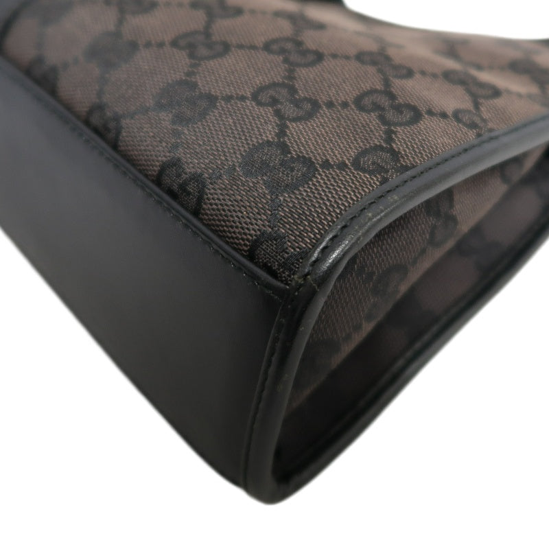 GUCCI GG Monogram Canvas Jackie Hobo Handbag Dark Brown Classic Pattern Black Leather Trim Silver Hardware Vintage Iconic Elegant Casual Shoulder Bag