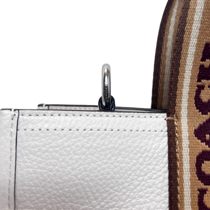 COACH Off-white Pebbled Leather Large Capacity Commuter Tote Handbag, With Brown COACH Logo Printed Webbing Handle, Comes With Detachable Adjustable Shoulder Stra