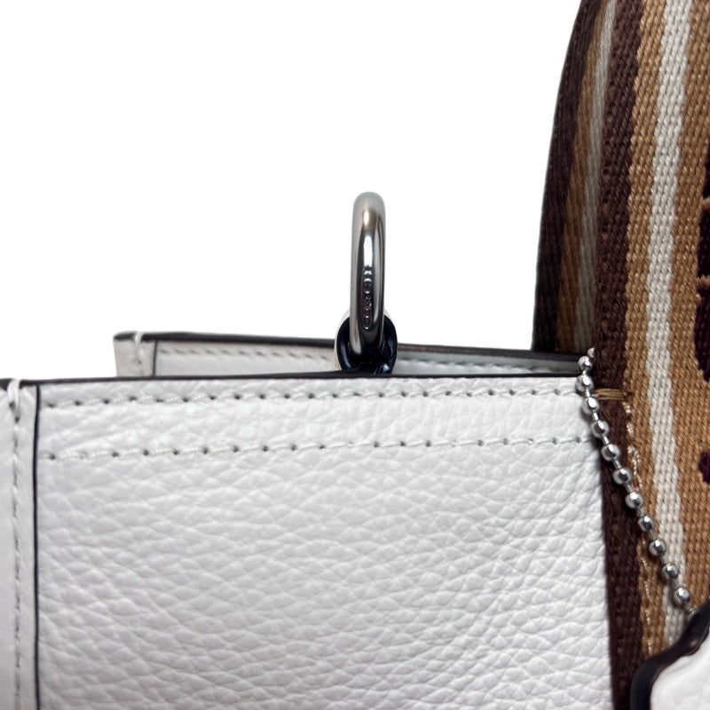 COACH Off-white Pebbled Leather Large Capacity Commuter Tote Handbag, With Brown COACH Logo Printed Webbing Handle, Comes With Detachable Adjustable Shoulder Stra