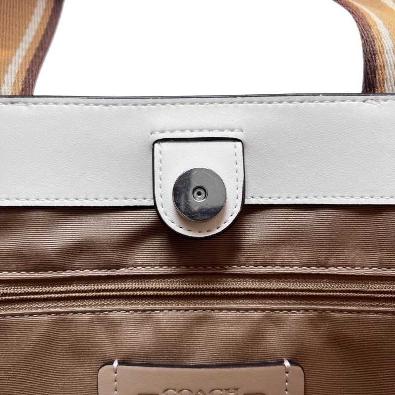 COACH Off-white Pebbled Leather Large Capacity Commuter Tote Handbag, With Brown COACH Logo Printed Webbing Handle, Comes With Detachable Adjustable Shoulder Stra