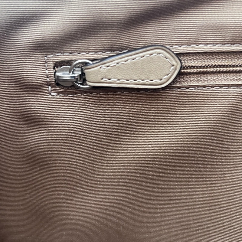 COACH Off-white Pebbled Leather Large Capacity Commuter Tote Handbag, With Brown COACH Logo Printed Webbing Handle, Comes With Detachable Adjustable Shoulder Stra