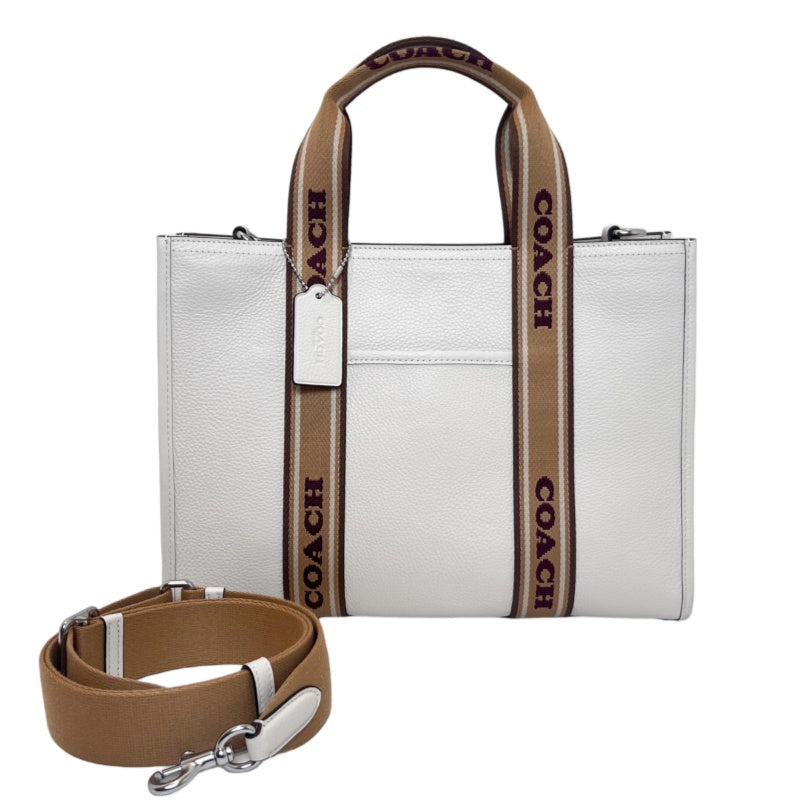 COACH Off-white Pebbled Leather Large Capacity Commuter Tote Handbag, With Brown COACH Logo Printed Webbing Handle, Comes With Detachable Adjustable Shoulder Stra