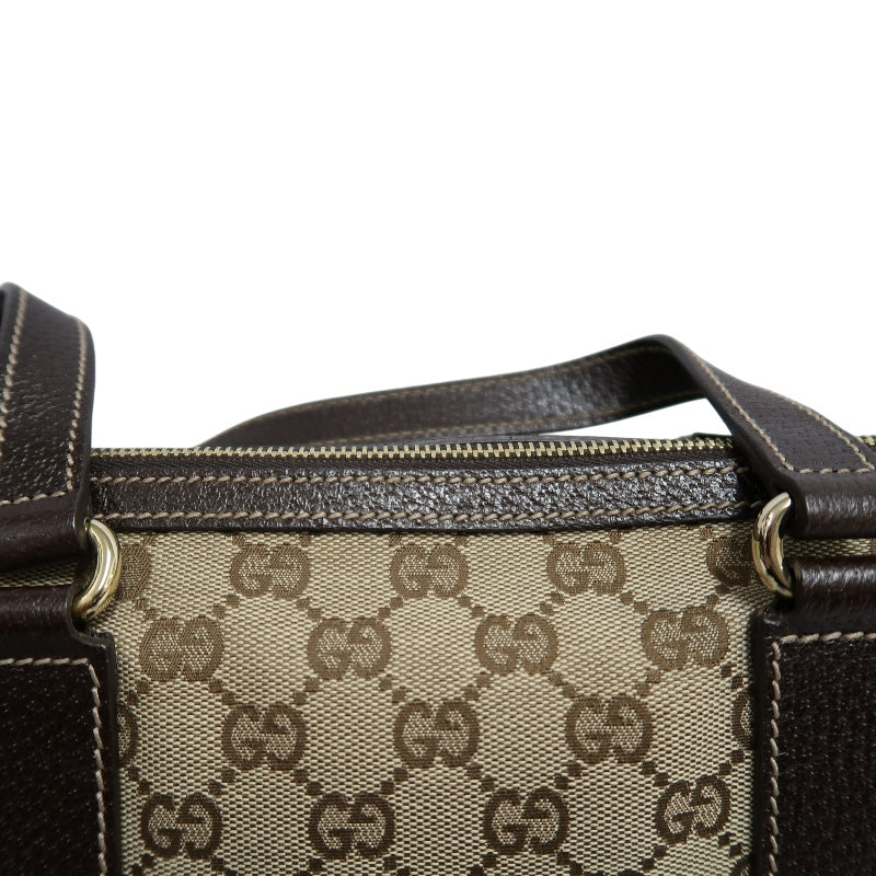GUCCI GG Monogram Canvas Mini Boston Handbag Beige Brown Classic Pattern Dark Brown Leather Trim Gold Brand Logo Hardware Vintage Spacious Casual Commute Bag