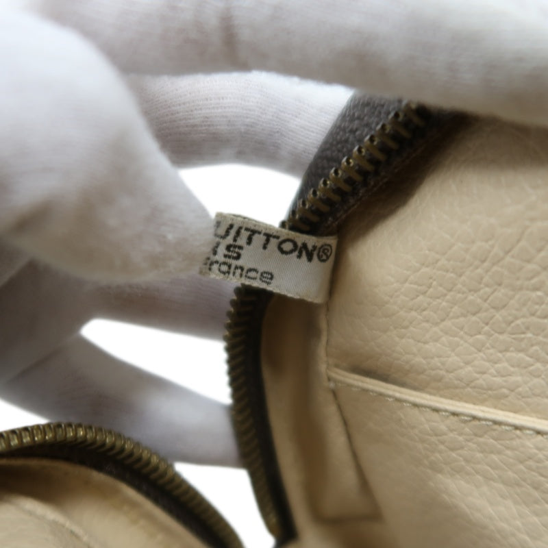 LOUIS VUITTON Trousse Toilette Monogram Pouch PVC Brown Clutch Bag