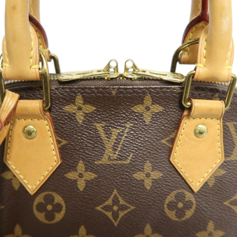 LOUIS VUITTON Monogram Alma BB Handbag PVC Brown Leather Trim