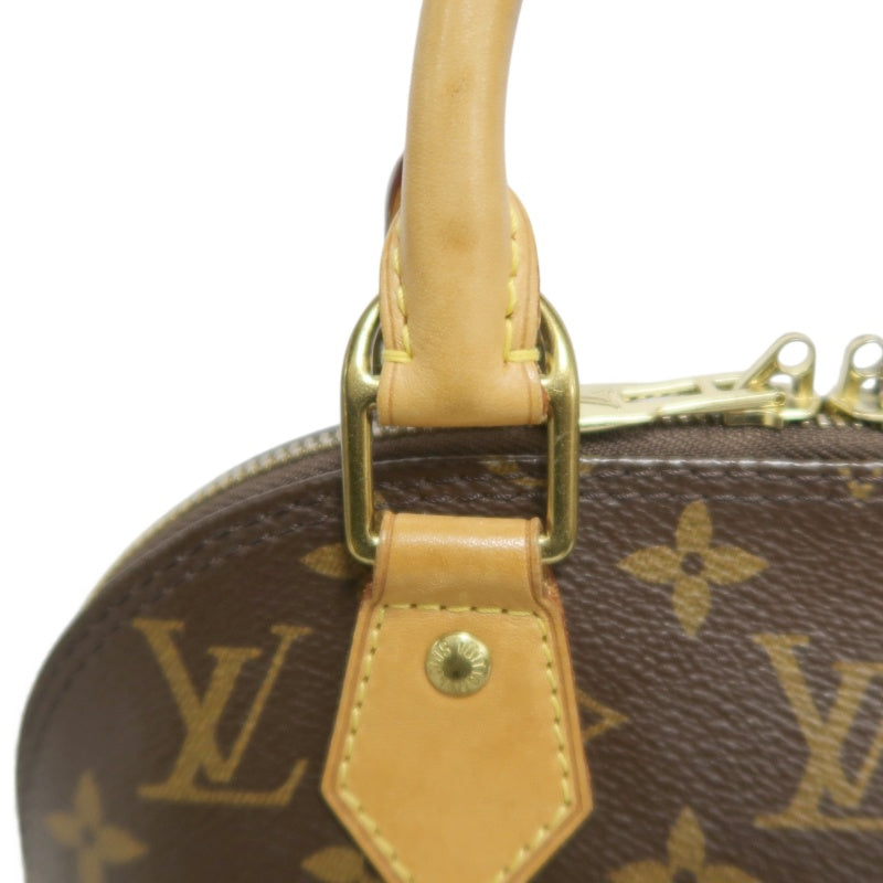LOUIS VUITTON Monogram Alma BB Handbag PVC Brown Leather Trim