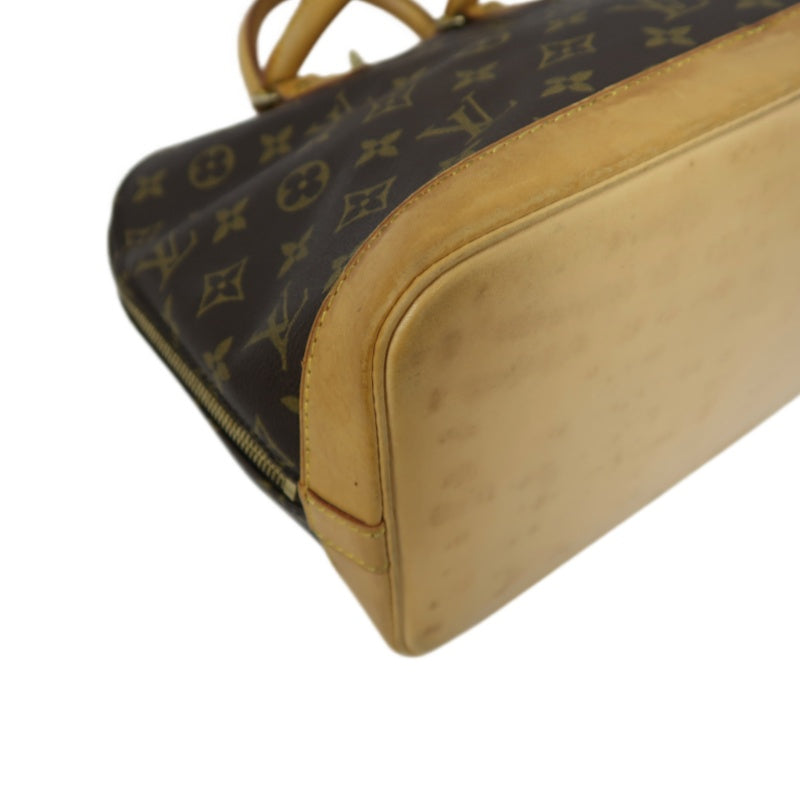 LOUIS VUITTON Alma Monogram Canvas Handbag Brow