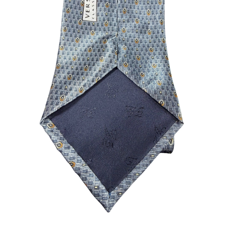 GIANNI VERSACE Micro Geometric Dot Jacquard 100% Pure Silk Tie Blue Gray Gold Accents Round Gold Tone GV Metal Plaque Detail Elegant Formal Business Necktie Luxury Vintage Accessory