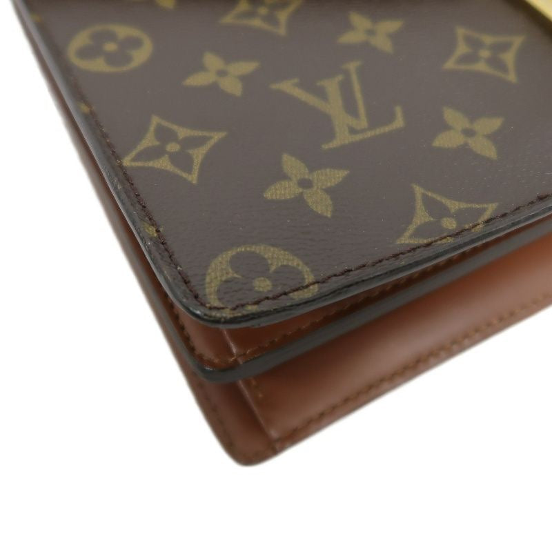 LOUIS VUITTON Concorde Monogram Handbag, Brown, with lock and key