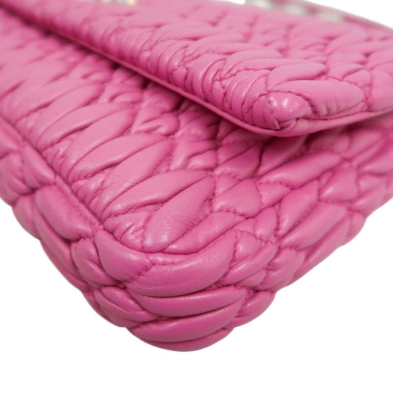 MIUMIU Coffer Matelassé Nappa Crystal Chain Shoulder Bag Clutch Bag Leather Pink Silver Hardware Pink PVC Coffer Pleated Crystal Chain Shoulder Bag