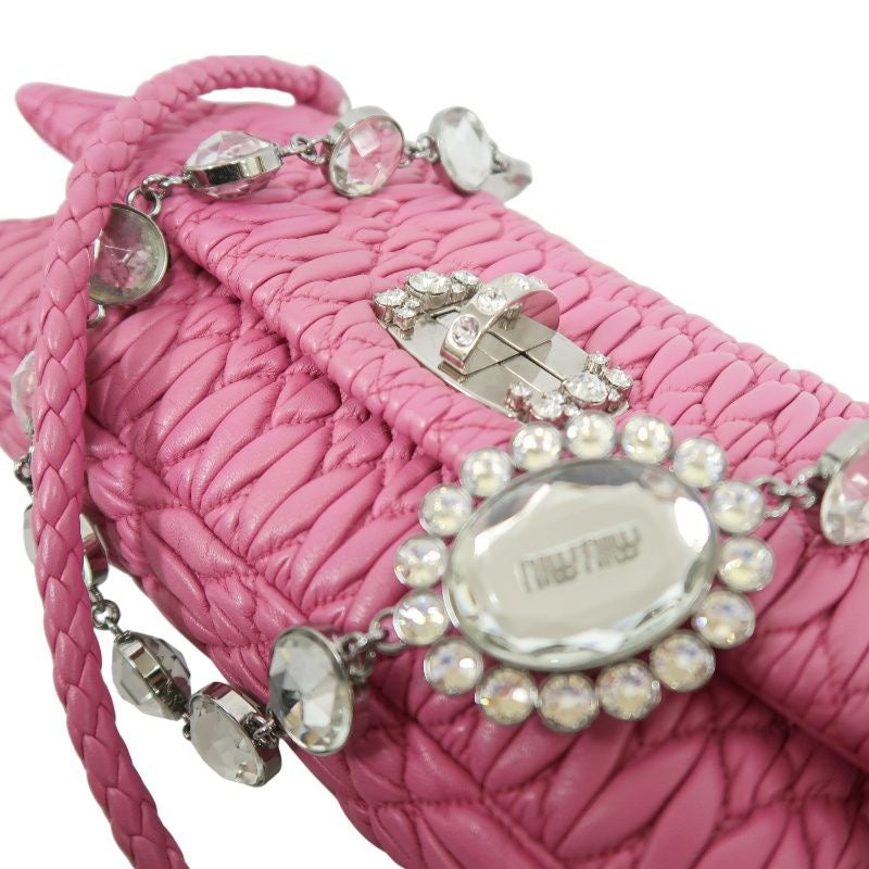 MIUMIU Coffer Matelassé Nappa Crystal Chain Shoulder Bag Clutch Bag Leather Pink Silver Hardware Pink PVC Coffer Pleated Crystal Chain Shoulder Bag