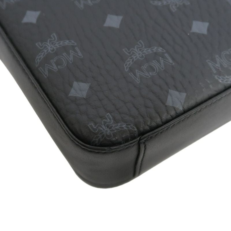 MCM (MCM), shoulder bag, black, with dust bag. MCM black PVC shoulder bag.