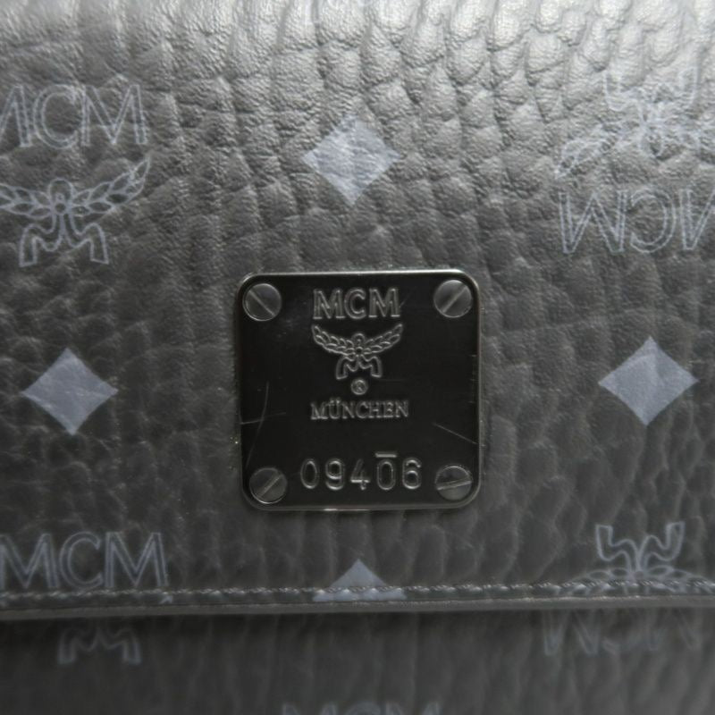 MCM (MCM), shoulder bag, black, with dust bag. MCM black PVC shoulder bag.