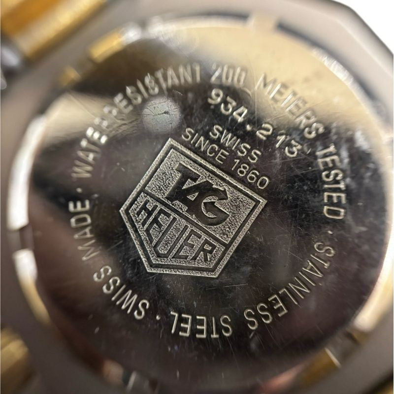 TAG HEUER Men's watch Silver tone Damaged box included Two‑tone (gold & silver) bracelet Model: 934.213 SS / GP 3000 Series Professional Quartz Silver dial Not running (no operation guarantee)