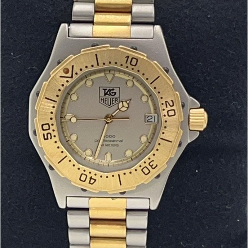 TAG HEUER Men's watch Silver tone Damaged box included Two‑tone (gold & silver) bracelet Model: 934.213 SS / GP 3000 Series Professional Quartz Silver dial Not running (no operation guarantee)