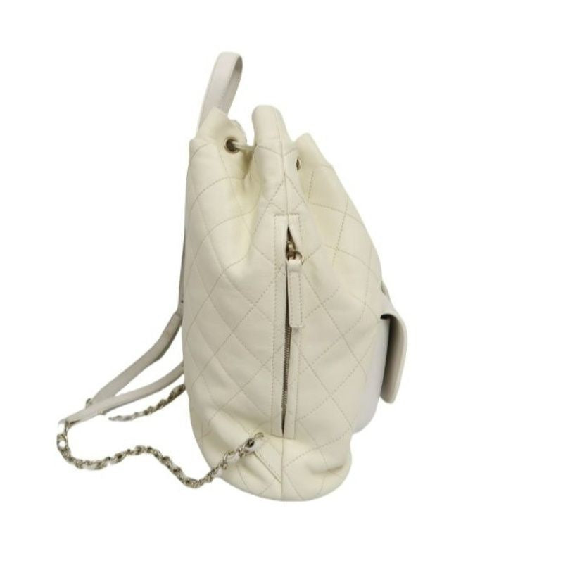 CHANEL Quilted Drawstring Backpack, Off-white Caviar Leather