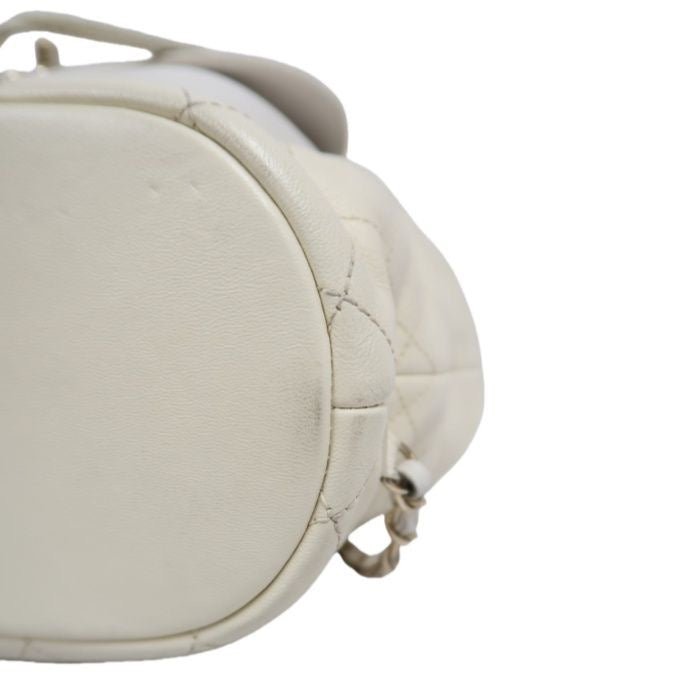 CHANEL Quilted Drawstring Backpack, Off-white Caviar Leather