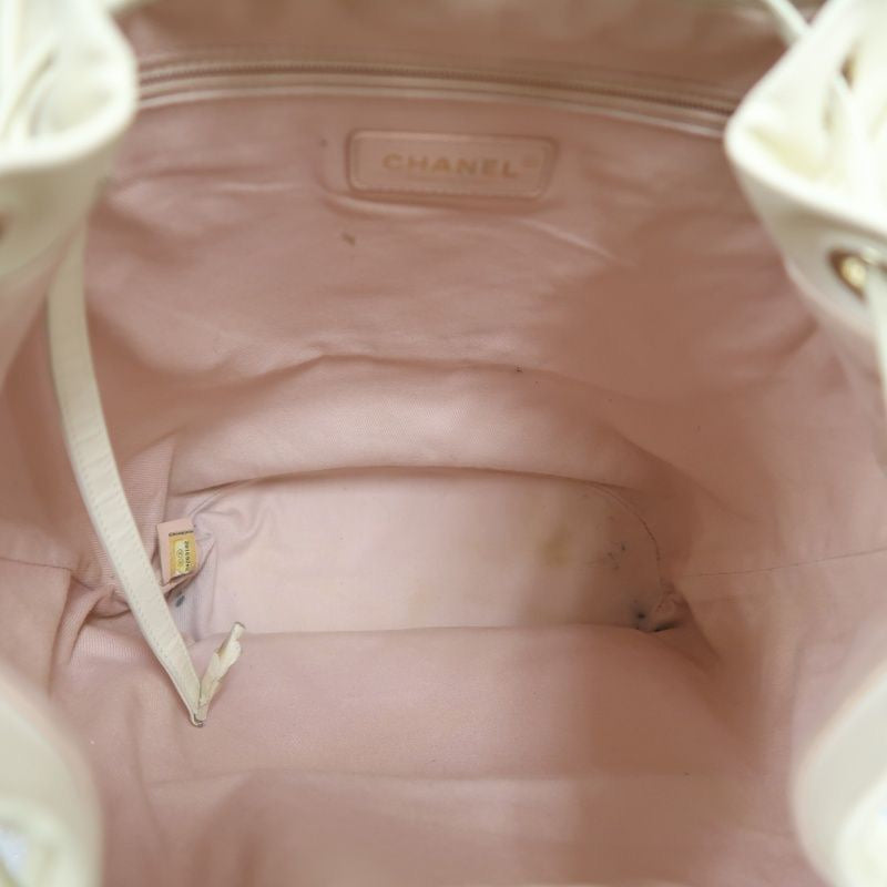 CHANEL Quilted Drawstring Backpack, Off-white Caviar Leather