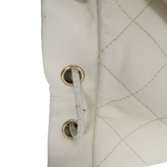 CHANEL Quilted Drawstring Backpack, Off-white Caviar Leather