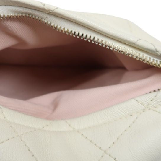 CHANEL Quilted Drawstring Backpack, Off-white Caviar Leather