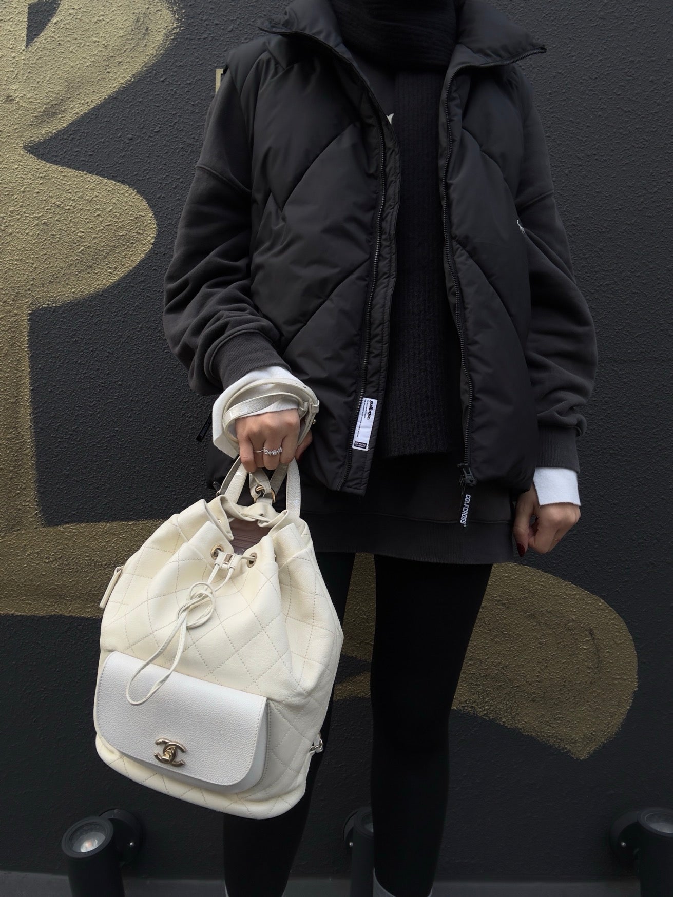 CHANEL Quilted Drawstring Backpack, Off-white Caviar Leather
