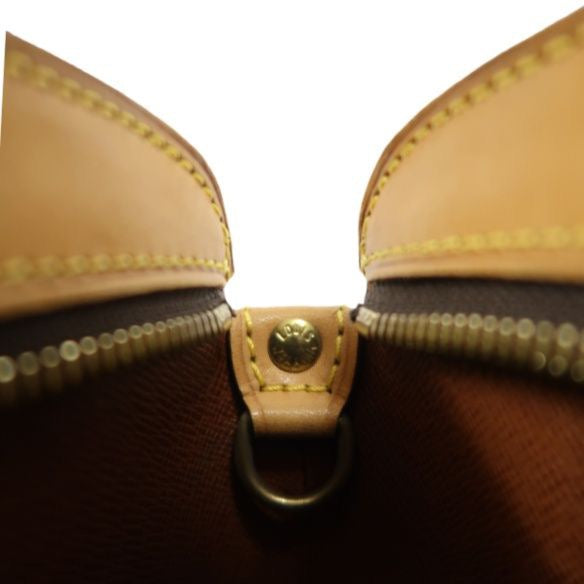 LOUIS VUITTON Monogram Drouot Crossbody Bag, Brown Coated Canvas (PVC), Barrel Shape
